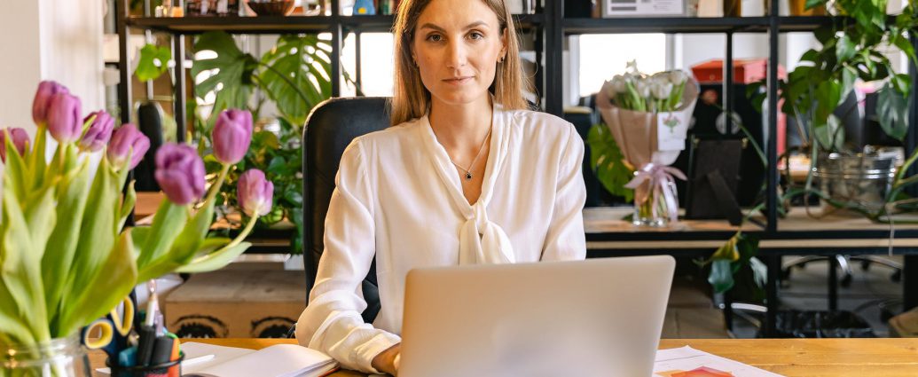 portrait shot of an employee using a laptop